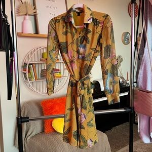 Button down shirt dress with a tie